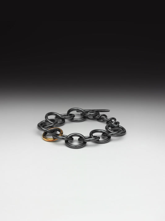 Oxidized Chunky Silver Bracelet with Gold Link