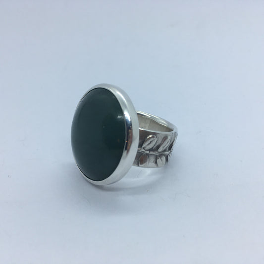 Small Round Pounamu and Silver Ring with Kowhai Band