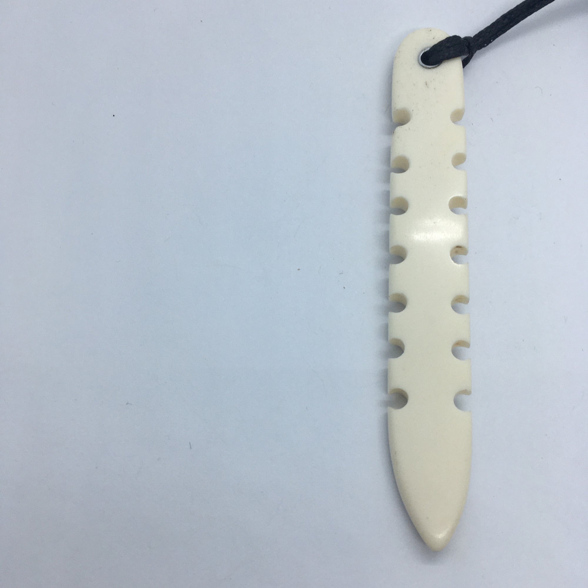 Long Toothed Bone Pendant
