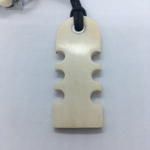 Small Toothed Bone Pendant