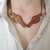 Two Tui Rimu Wood Necklace